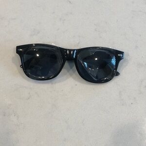 Source Unknown Sleek Black Sunglasses